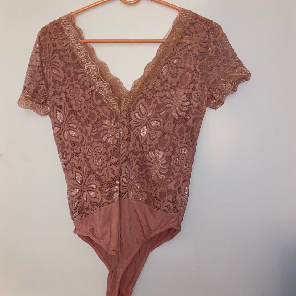 Pink laced body suit